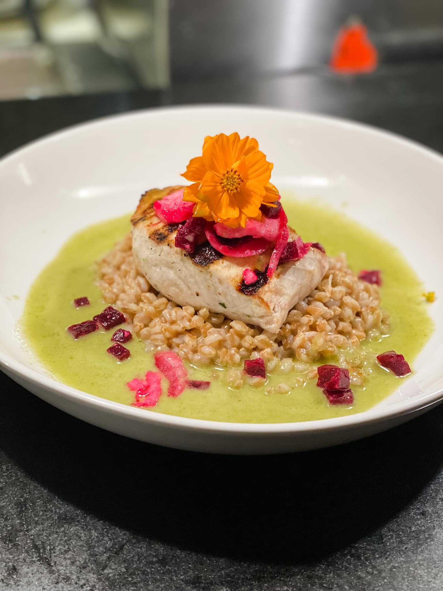 Wood-grilled Swordfish, Parmesan Farro, roasted beet and mozzarella salad, basil lemon butter